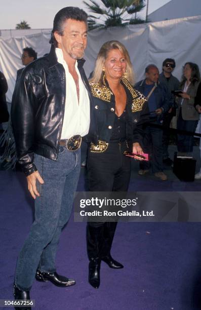Producer Stephen Cannell and wife Marcia Finch attending 37th Annual SHARE Boomtown Party on May 19, 1990 at the Santa Monica Civic Auditorium in...