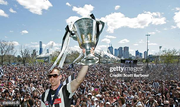 Magpies captain Nick Maxwell holds the Premiership Cup aloft during the Collingwood Magpies AFL Grand Final reception at Gosch's Park on October 3,...