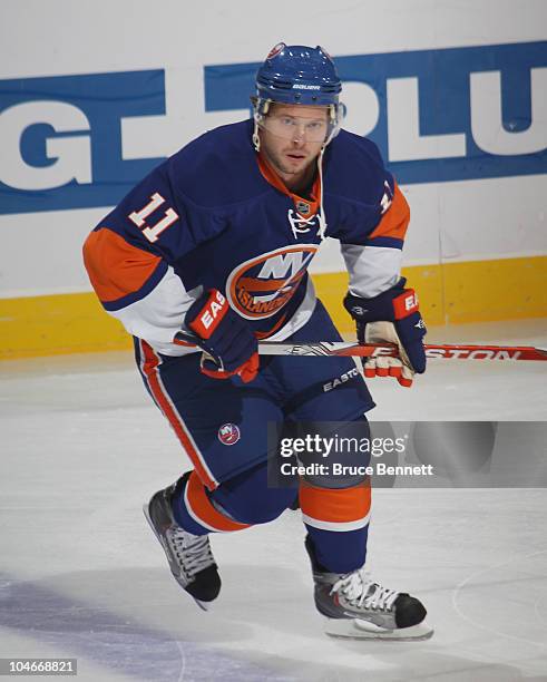 Andy Hilbert of the New York Islanders skates against the New Jersey Devils at the Nassau Veterans Memorial Coliseum on October 2, 2010 in Uniondale,...
