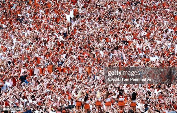 Texas Longhorns fans celebrate after the Texas Longhorns beat the Oklahoma Sooners 48-45 in the 2018 AT&T Red River Showdown at Cotton Bowl on...