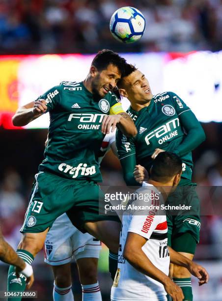 Luan Garcia and Moises of Palmeiras in action during the match against Sao Paulo for the Brasileirao Series A 2018 at Morumbi Stadium on October 06,...