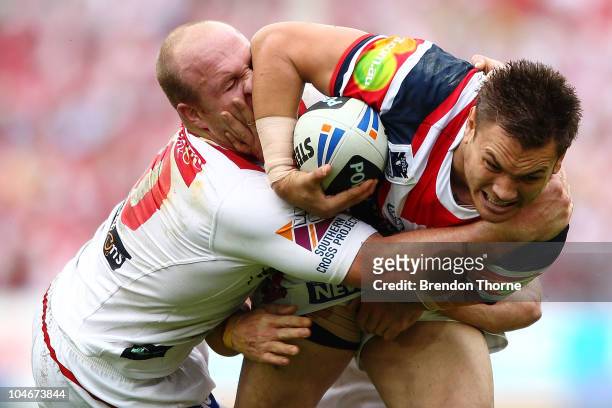 Jared Waerea-Hargreaves of the Roosters is tackled by Michael Weyman of the Dragons during the NRL Grand Final match between the St George Illawarra...