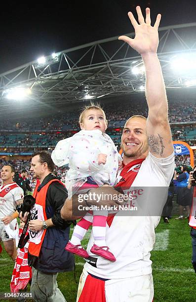 Matt Cooper of the Dragons waves to the crowd during the NRL Grand Final match between the St George Illawarra Dragons and the Sydney Roosters at ANZ...