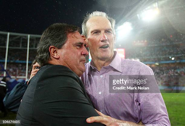 Dragons CEO Peter Doust and Dragons coach Wayne Bennett embrace after the NRL Grand Final match between the St George Illawarra Dragons and the...