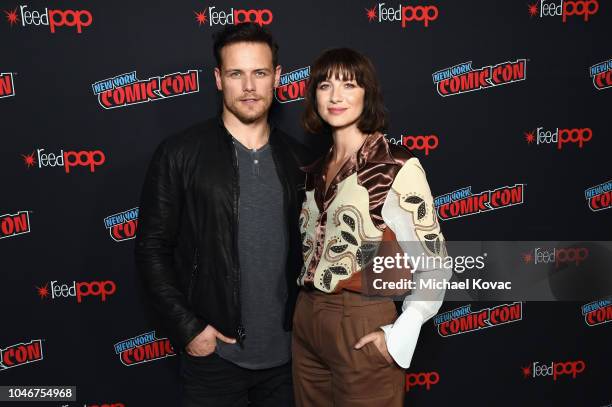 Actors Sam Heughan and Caitriona Balfe attend as Starz brings Outlander to NYCC 2018 at Javits Center on October 6, 2018 in New York City.