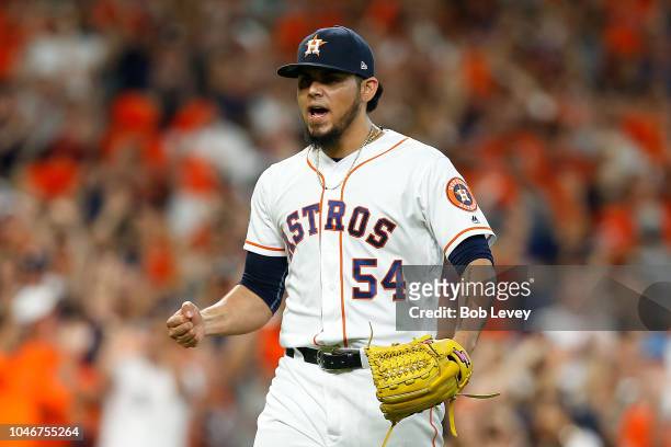 Roberto Osuna of the Houston Astros reacts after a strikeout in the eighth inning against the Cleveland Indians during Game Two of the American...
