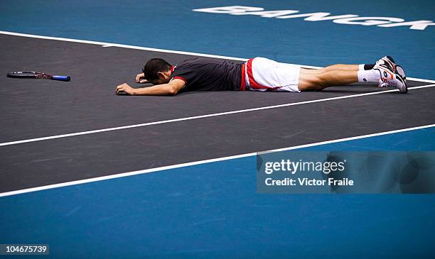 Guillermo Garcia-Lopez of Spain celebrates match point in the singles final match against Jarkko Nieminen of Finland on Day 9 of the PTT Thailand...