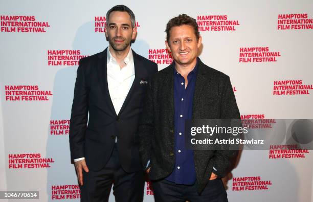 Producer Glen Zipper and Director Alex Winter attend the photo call for "The Panama Papers" at UA East Hampton Cinema 6 during Hamptons International...