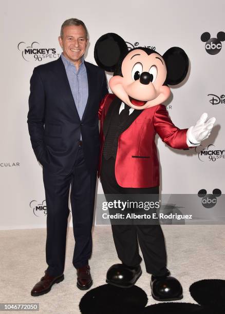 Bob Iger and Mickey Mouse attend Mickey's 90th Spectacular at The Shrine Auditorium on October 6, 2018 in Los Angeles, California.