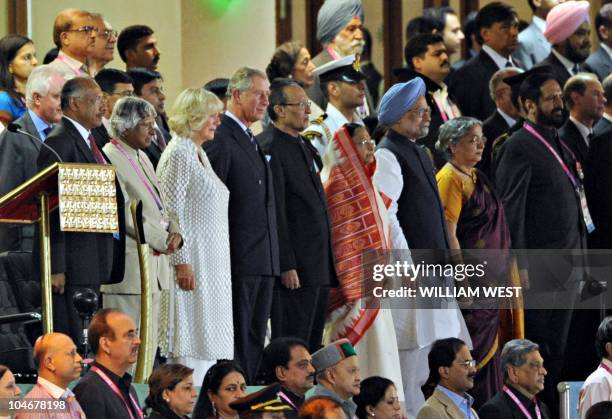 Britain's Prince of Wales, Prince Charles stands with Indian President Pratibha Patil , Indian Prime Minister Manmohan Singh , and Camilla, Duchess...