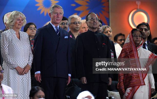 Britain's Prince of Wales, Prince Charles stands with Indian President Pratihba Patil her husband Devisingh Ramsingh Shekhawat and Camilla, Duchess...