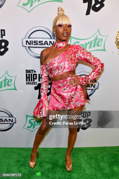 Rapper Asian Doll arrives at the BET Hip Hop Awards 2018 at Fillmore Miami Beach on October 6, 2018 in Miami Beach, Florida.