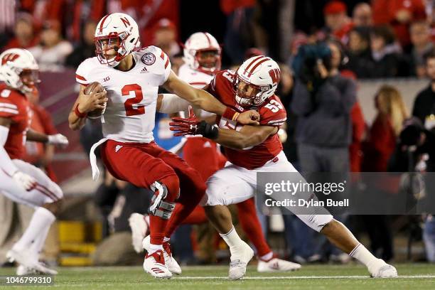 Edwards of the Wisconsin Badgers sacks Adrian Martinez of the Nebraska Cornhuskers in the second quarter at Camp Randall Stadium on October 6, 2018...