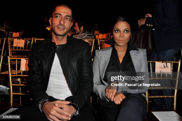 Wissam Al Mana and Janet Jackson attend the John Galliano Ready to Wear Spring/Summer 2011 show during Paris Fashion Week at Opera Comique on October...