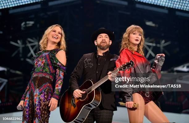 Jennifer Nettles and Kristian Bush of Sugarland perform onstage with Taylor Swift during the reputation Stadium Tour at AT&T Stadium on October 6,...