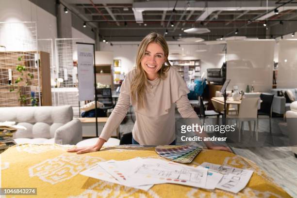 interior designer working on home design at a furniture store - decoration stock pictures, royalty-free photos & images