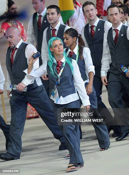 An athlete from Wales walks during the XIX Commonwealth Games opening ceremony at the Jawaharlal Nehru Stadium in New Delhi on October 3, 2010....