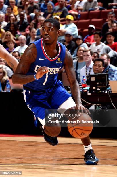 Jawun Evans of the LA Clippers handles the ball against the Los Angeles Lakers during a pre-season game on October 6, 2018 at Honda Center in...