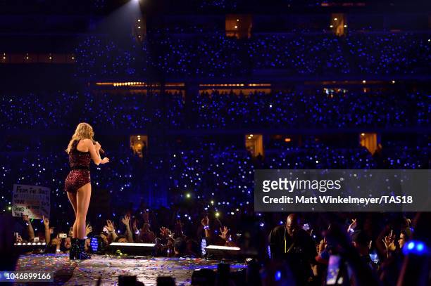 Taylor Swift performs onstage during the Taylor Swift reputation Stadium Tour at AT&T Stadium on October 6, 2018 in Arlington, Texas.