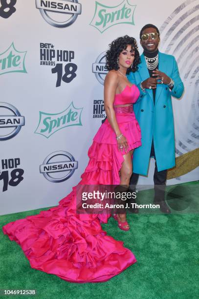 Keyshia Ka'Oir and Gucci Mane arrive to the BET Hip Hop Awards at the Fillmore Miami Beach on October 6, 2018 in Miami Beach, Florida.
