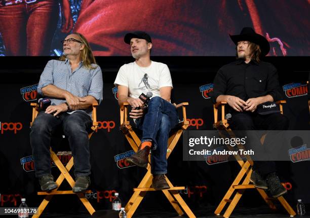 Greg Nicotero, Andrew Lincoln and Norman Reedus speak onstage during The Walking Dead panel during New York Comic Con at Jacob Javits Center on...