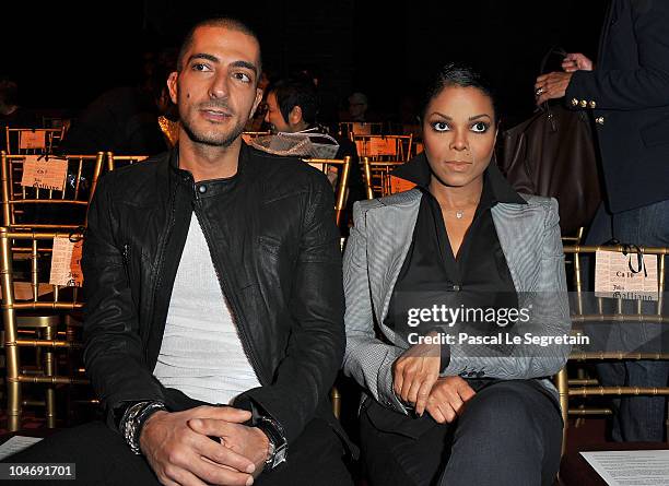 Wissam Al Mana and Janet Jackson attend the John Galliano Ready to Wear Spring/Summer 2011 show during Paris Fashion Week at Opera Comique on October...