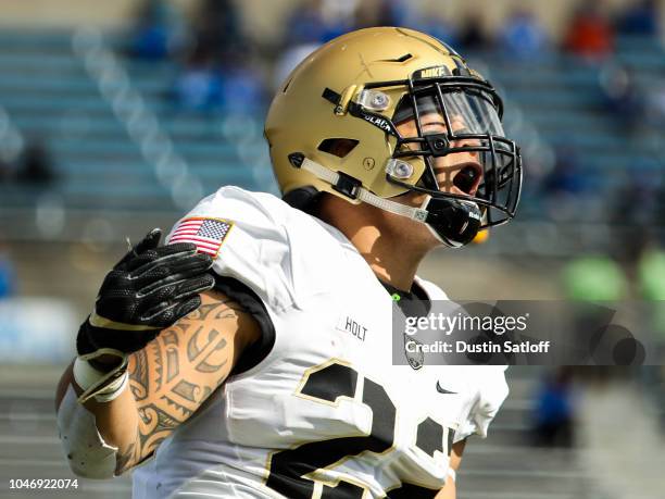 Calen Knight Calen Holt of the Army Black Knights reacts after being called for a ...