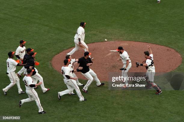 The San Francisco Giants celebrate after they beat the San Diego Padres to win the National League West Title at AT&T Park on October 3, 2010 in San...