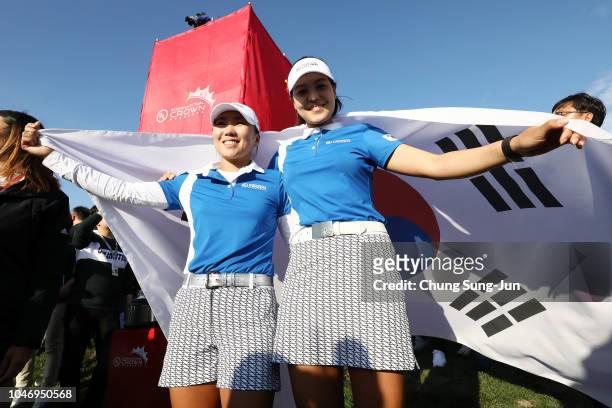In-Kyung Kim and In Gee Chun of South Korea celebrate winning on day four of the UL International Crown at Jack Nicklaus Golf Club on October 7, 2018...