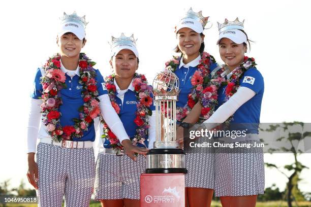 Sung Hyun Park, In-Kyung Kim, In Gee Chun and So Yoen Ryu of South Korea pose for photographs with the trophy after winning the UL International...