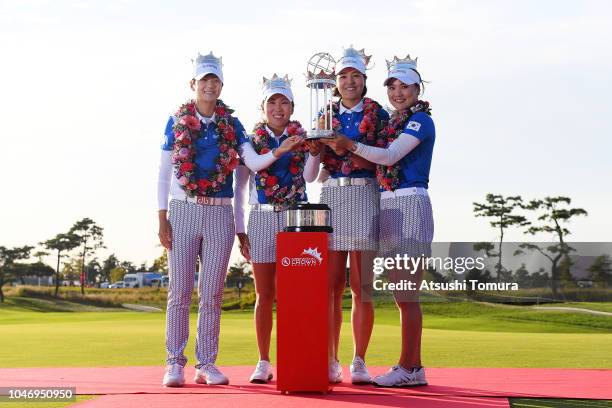 Sung Hyun Park, In-Kyung Kim, In Gee Chun and So Yoen Ryu of South Korea pose for photographs with the trophy after winning the UL International...