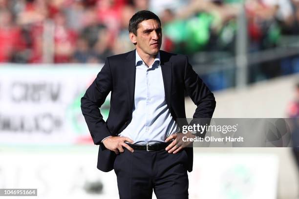 Head coach Tayfun Korkut of Stuttgart disappointed during the Bundesliga match between Hannover 96 and VfB Stuttgart at HDI-Arena on October 6, 2018...