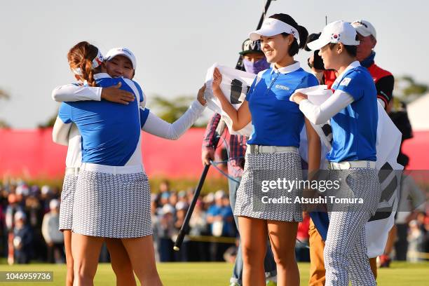 So Yoen Ryu, In-Kyung Kim, Sung Hyun Park and In Gee Chun of South Korea celebrate winning on day four of the UL International Crown at Jack Nicklaus...