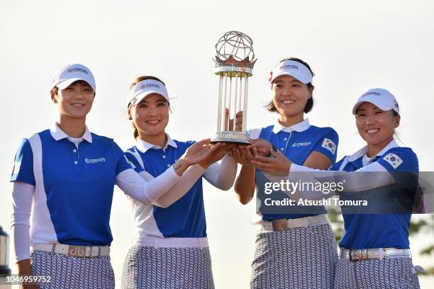 Sung Hyun Park, So Yoen Ryu, In Gee Chun and In-Kyung Kim of South Korea pose for photographs with the trophy after winning the UL International...