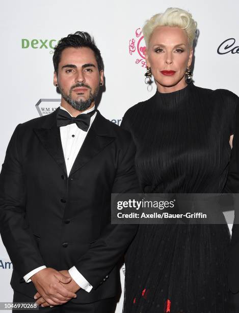 Mattia Dessi and Brigitte Nielsen attend the 2018 Carousel of Hope Ball at The Beverly Hilton Hotel on October 6, 2018 in Beverly Hills, California.