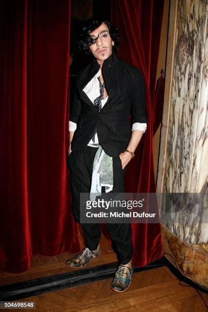 John Galliano attends in backstage the John Galliano Ready to Wear Spring/Summer 2011 show during Paris Fashion Week at Opera Comique on October 3,...