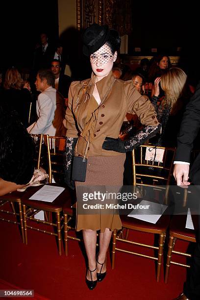 Dta von Teese attends the John Galliano Ready to Wear Spring/Summer 2011 show during Paris Fashion Week at Opera Comique on October 3, 2010 in Paris,...