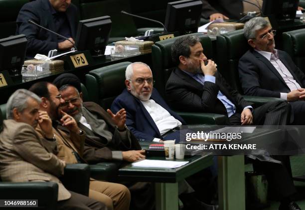 Iran's Foreign Minister Mohammad Javad Zarif is pictured at the parliament in Tehran on October 7 during a meeting over the a bill to counter...