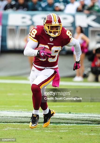 Santana Moss of the Washington Redskins carries the ball against the Philadelphia Eagles at Lincoln Financial Field on October 3, 2010 in...