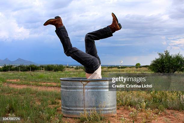 man in a bucket - careless stock pictures, royalty-free photos & images