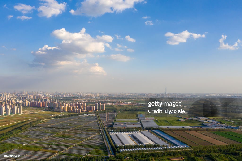 Aerial view of fields landscape and city