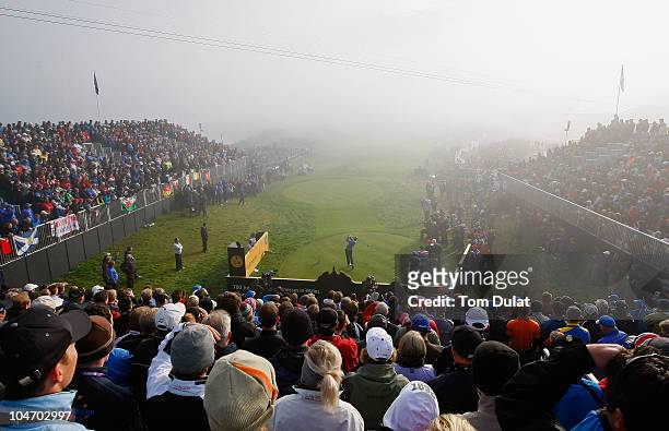 Luke Donald of Europe watches his tee shot on the first hole in the singles matches during the 2010 Ryder Cup at the Celtic Manor Resort on October...