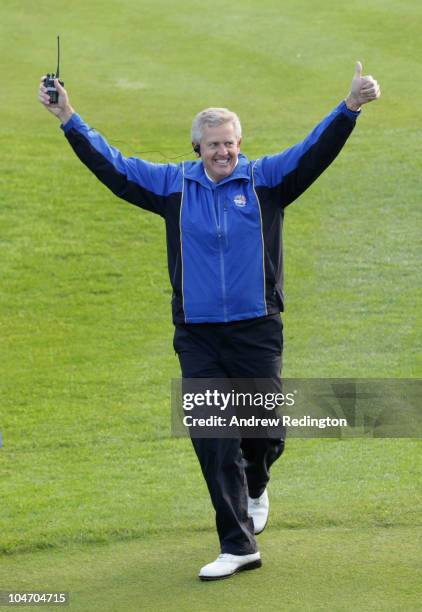 The European Team Captain Colin Montgomerie waves to the gallery on the first tee in the singles matches during the 2010 Ryder Cup at the Celtic...