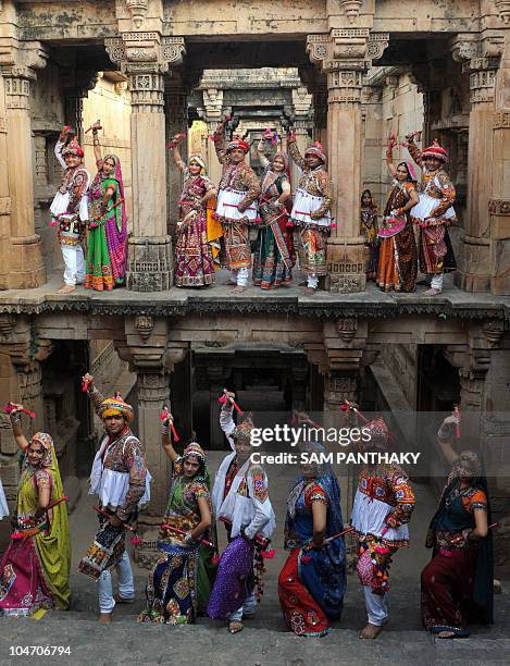 Indian dancers from the Panghat Group of Performing Arts participate during a full traditional dress rehearsal in preparation for the Hindu Navratri...