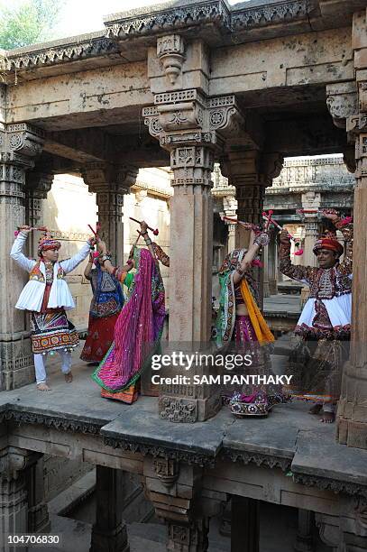 Indian dancers from the Panghat Group of Performing Arts participate during a full traditional dress rehearsal in preparation for the Hindu Navratri...