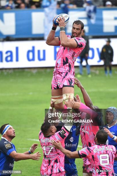 Stade Francais' captain Yoann Maestri grabs the ball in a line out during the top 14 rugby match between Castres and Stade Francais at the Pierre...