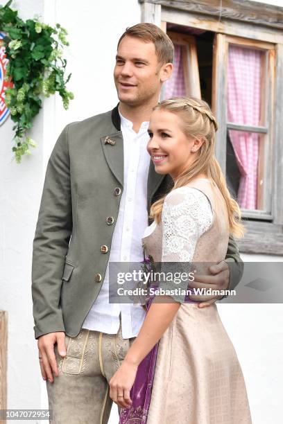 Manuel Neuer and his wife Nina Weiss attend the Oktoberfest beer festival at Kaefer Wiesenschaenke tent at Theresienwiese on October 7, 2018 in...