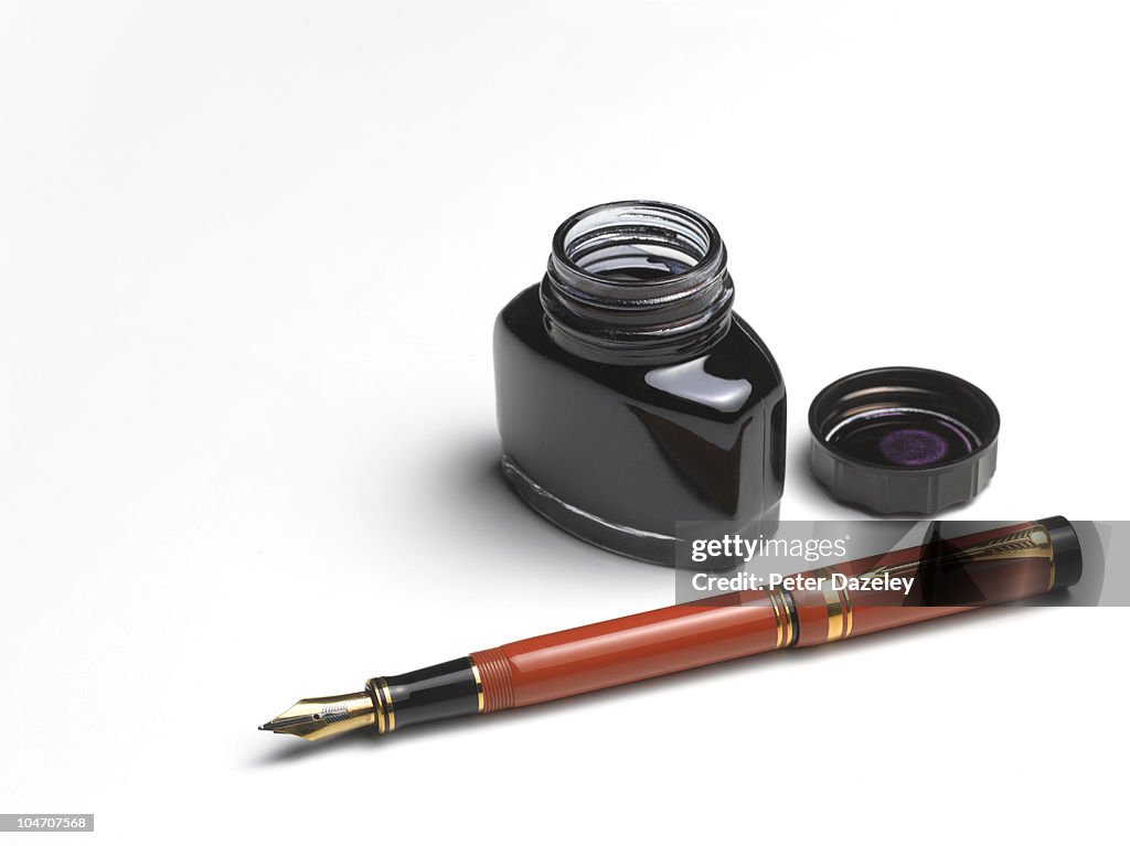 Fountain pen and ink well with copy space