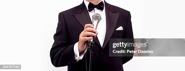 master of ceremonies comedian with microphone - presentator amusement stockfoto's en -beelden