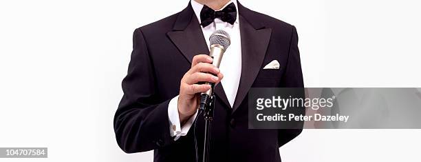 master of ceremonies comedian with microphone - comedian mic stock pictures, royalty-free photos & images